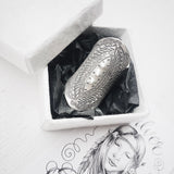 SILVER SHIELDS RING