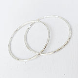 SLIM HAMMERED SILVER BANGLE 70MM