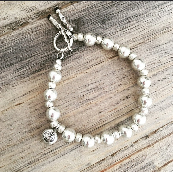 BUDDHIST BELL CHARM BRACELET