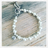 BUDDHIST BELL CHARM BRACELET